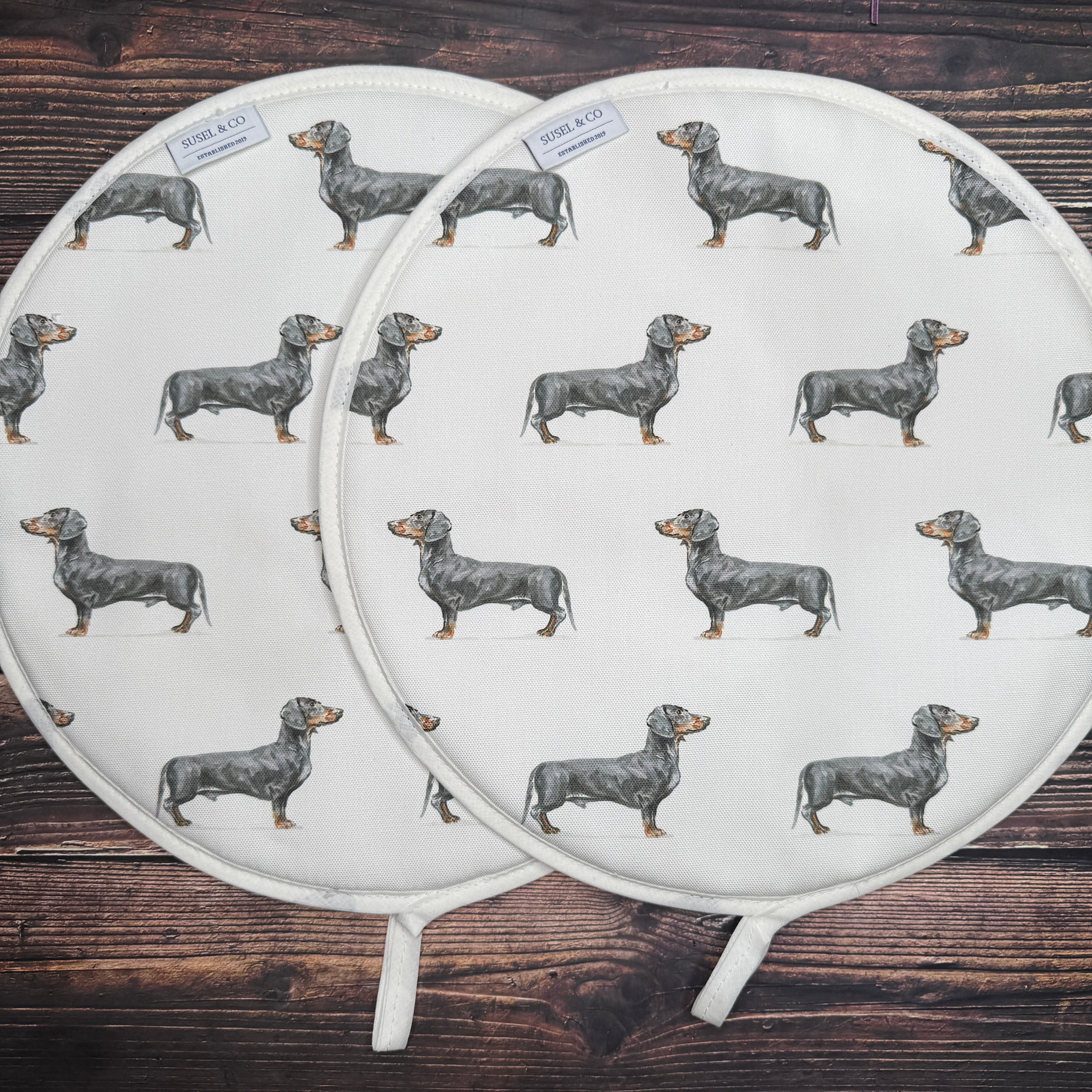 Pair of Dachshund patterned hob covers for Aga range cookers