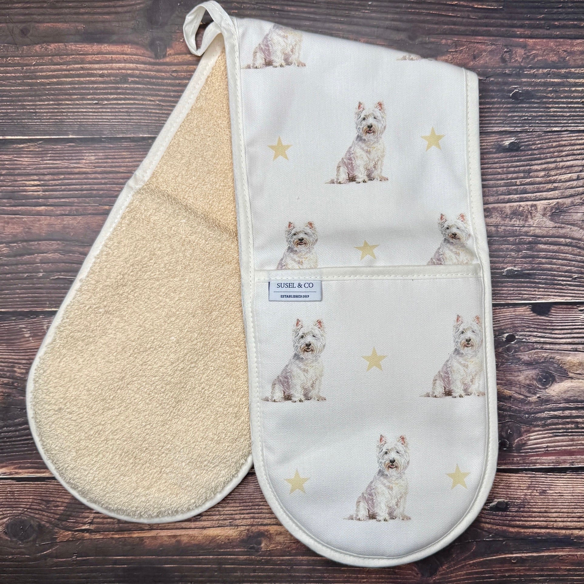 West Highland Terrier double oven gloves hanging in a kitchen