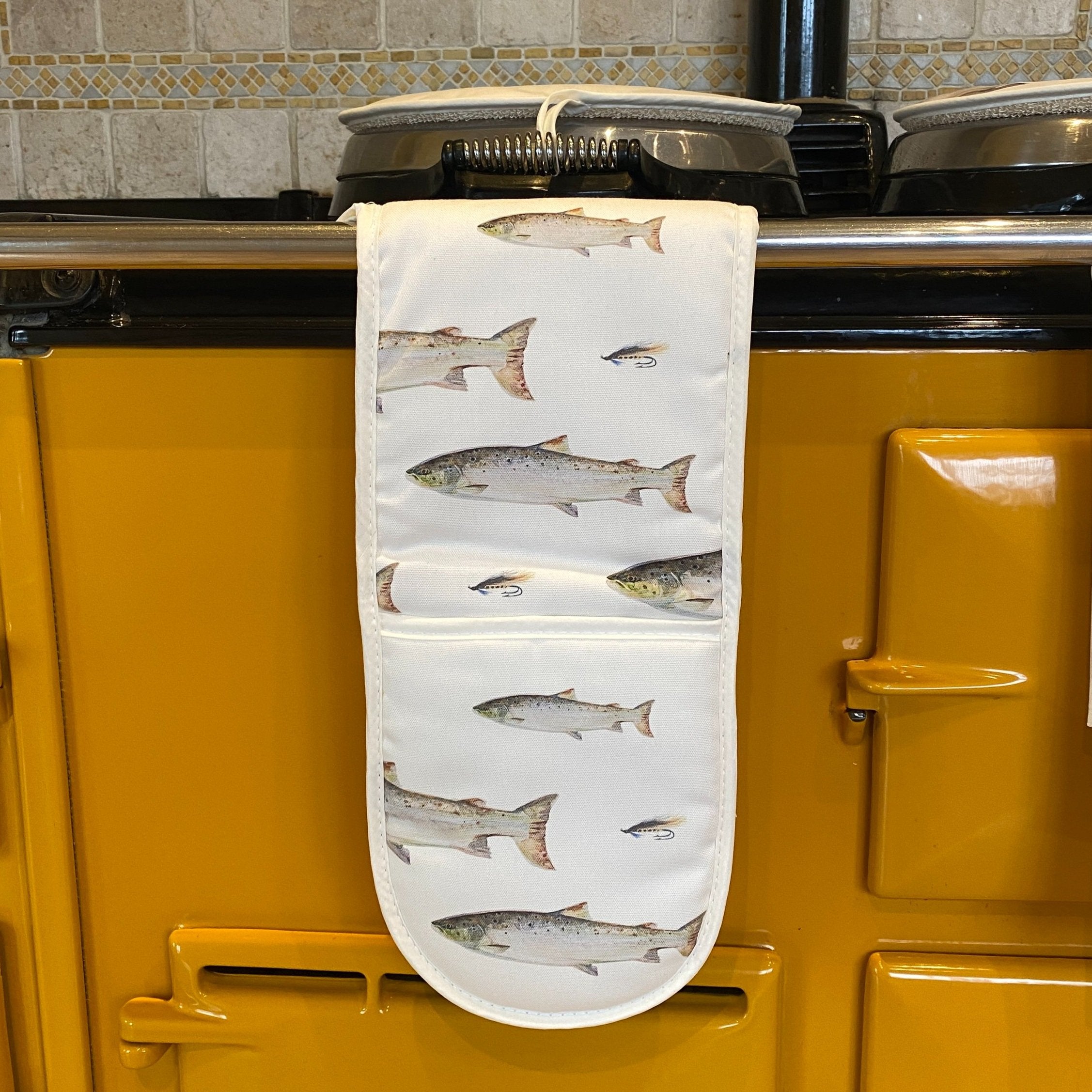 Atlantic Salmon double oven gloves hanging in a kitchen