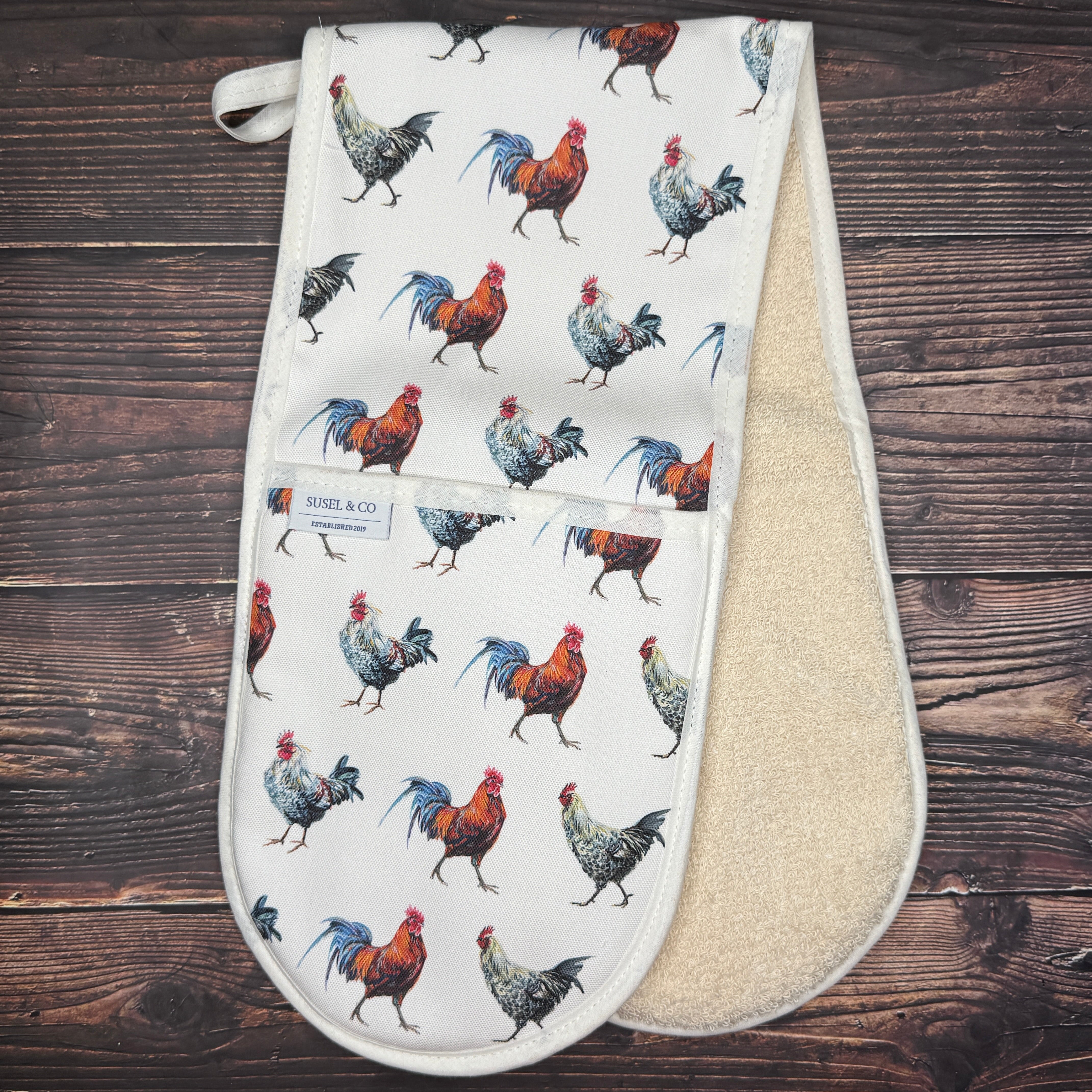 Hen House double oven gloves hanging in a kitchen