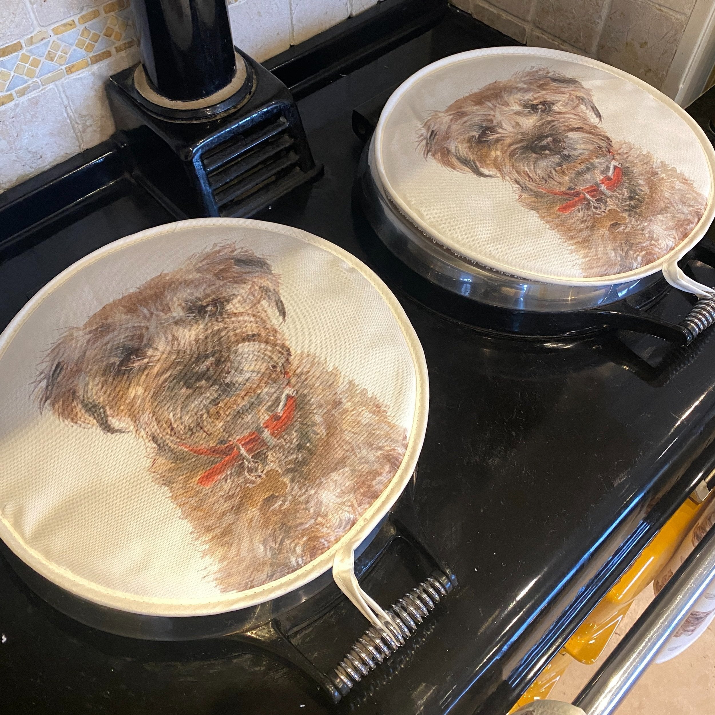 Pair of Border Terrier patterned hob covers for Aga range cookers