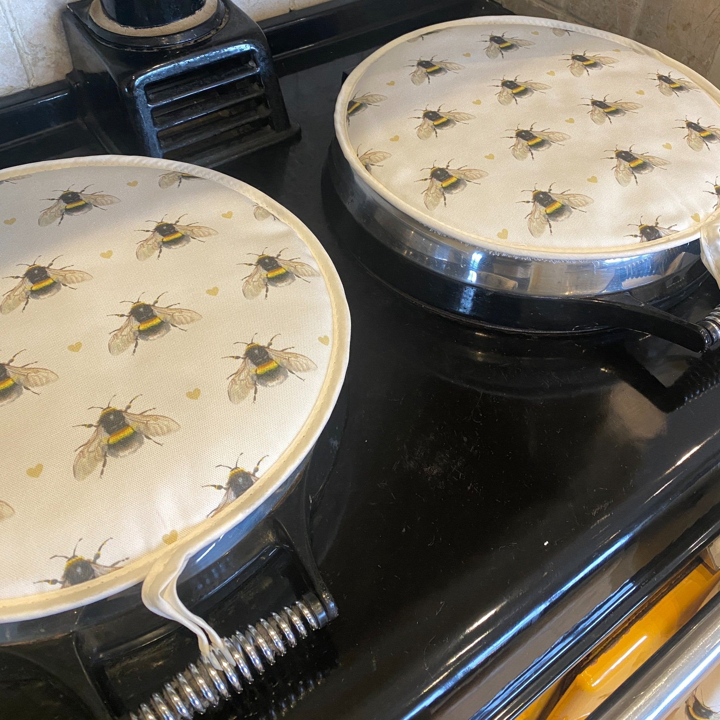 Pair of Bumble Bee patterned hob covers for Aga range cookers