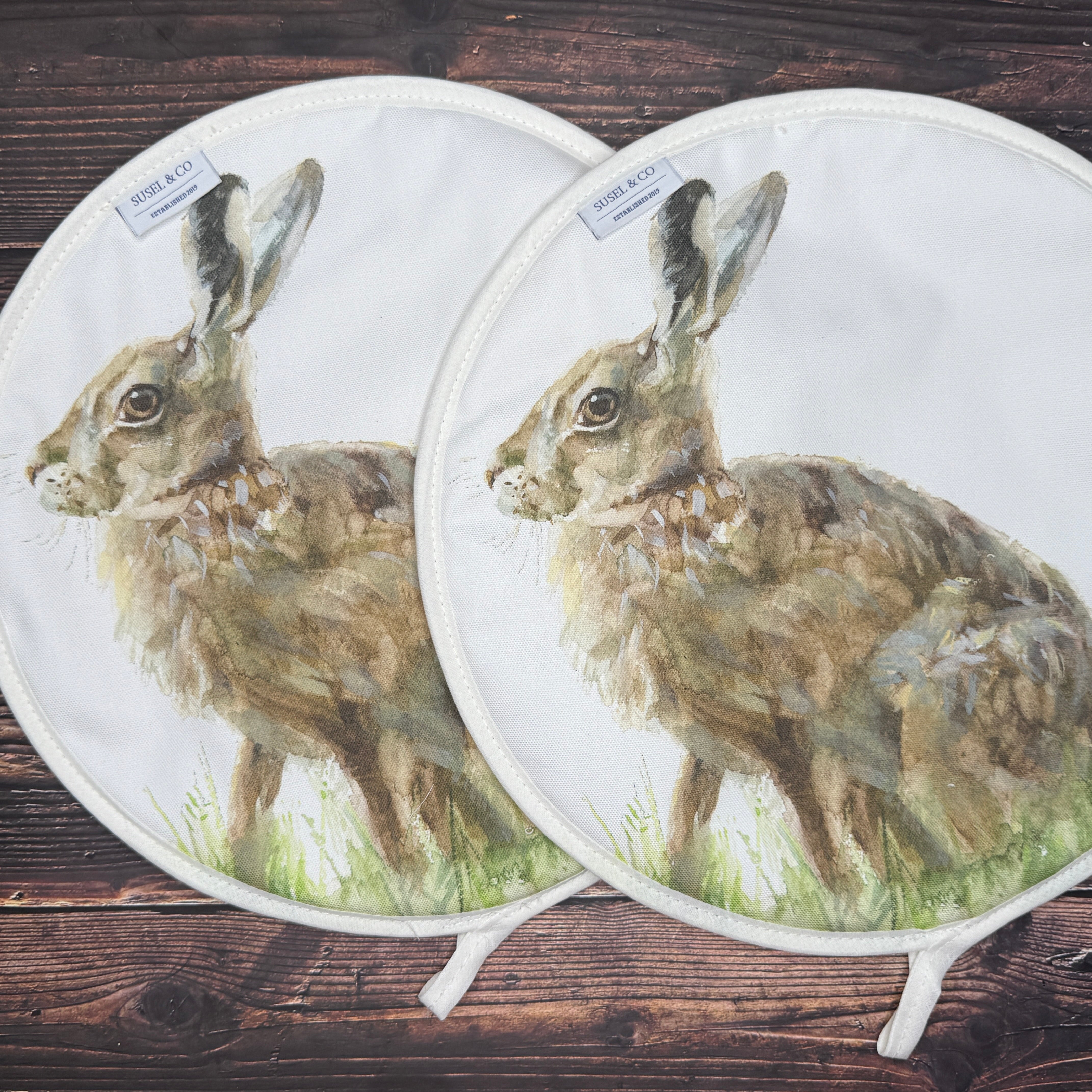 Pair of Hare patterned hob covers for Aga range cookers