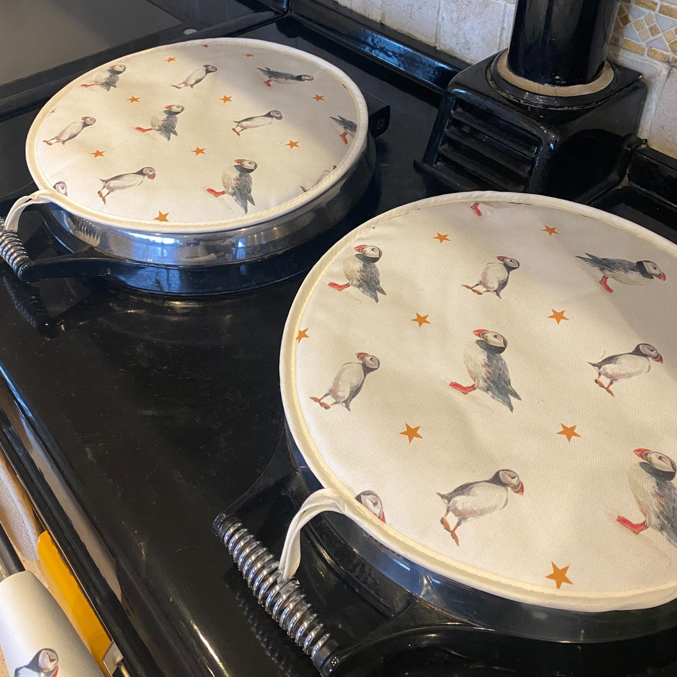 Pair of Puffins patterned hob covers for Aga range cookers
