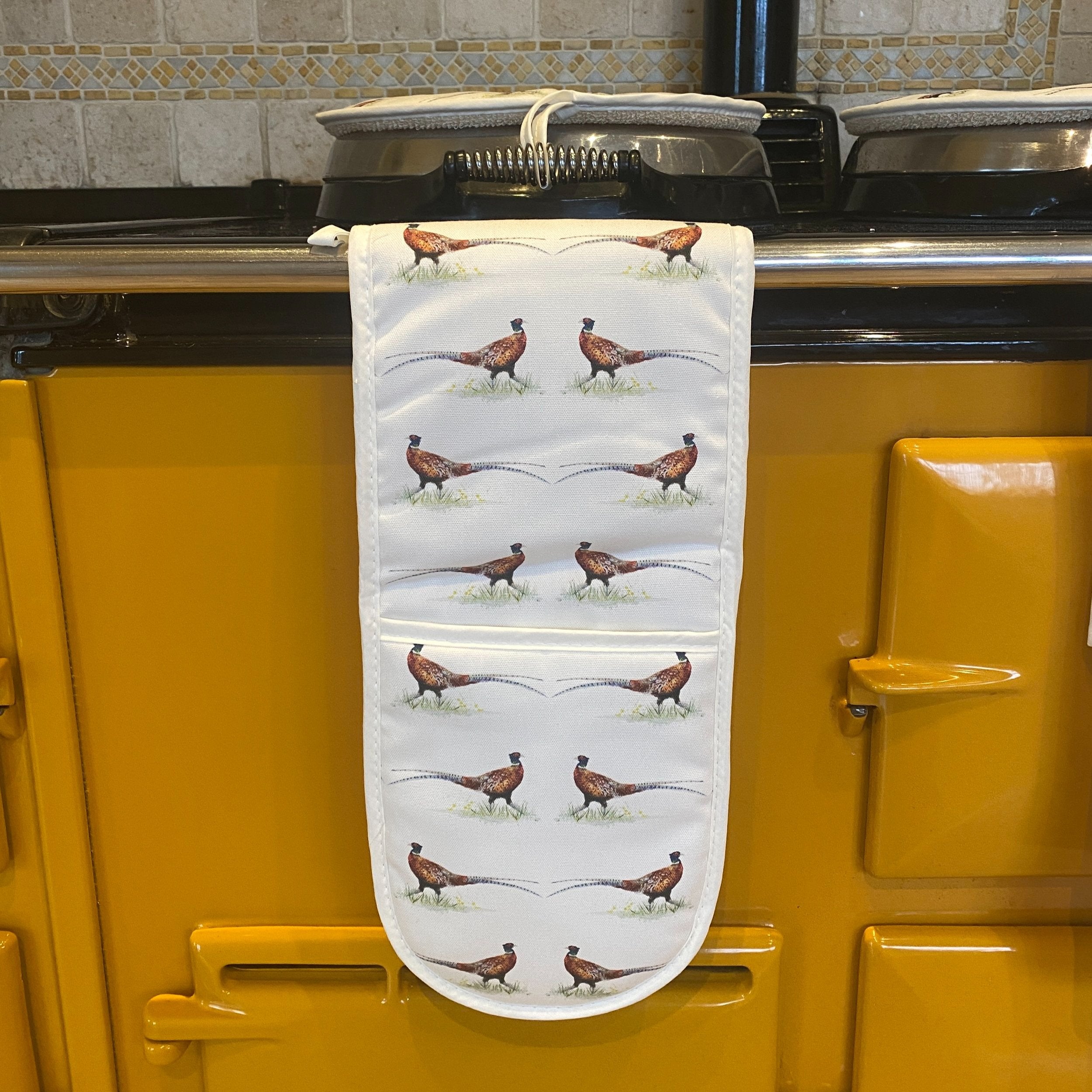 Brace double oven gloves hanging in a kitchen